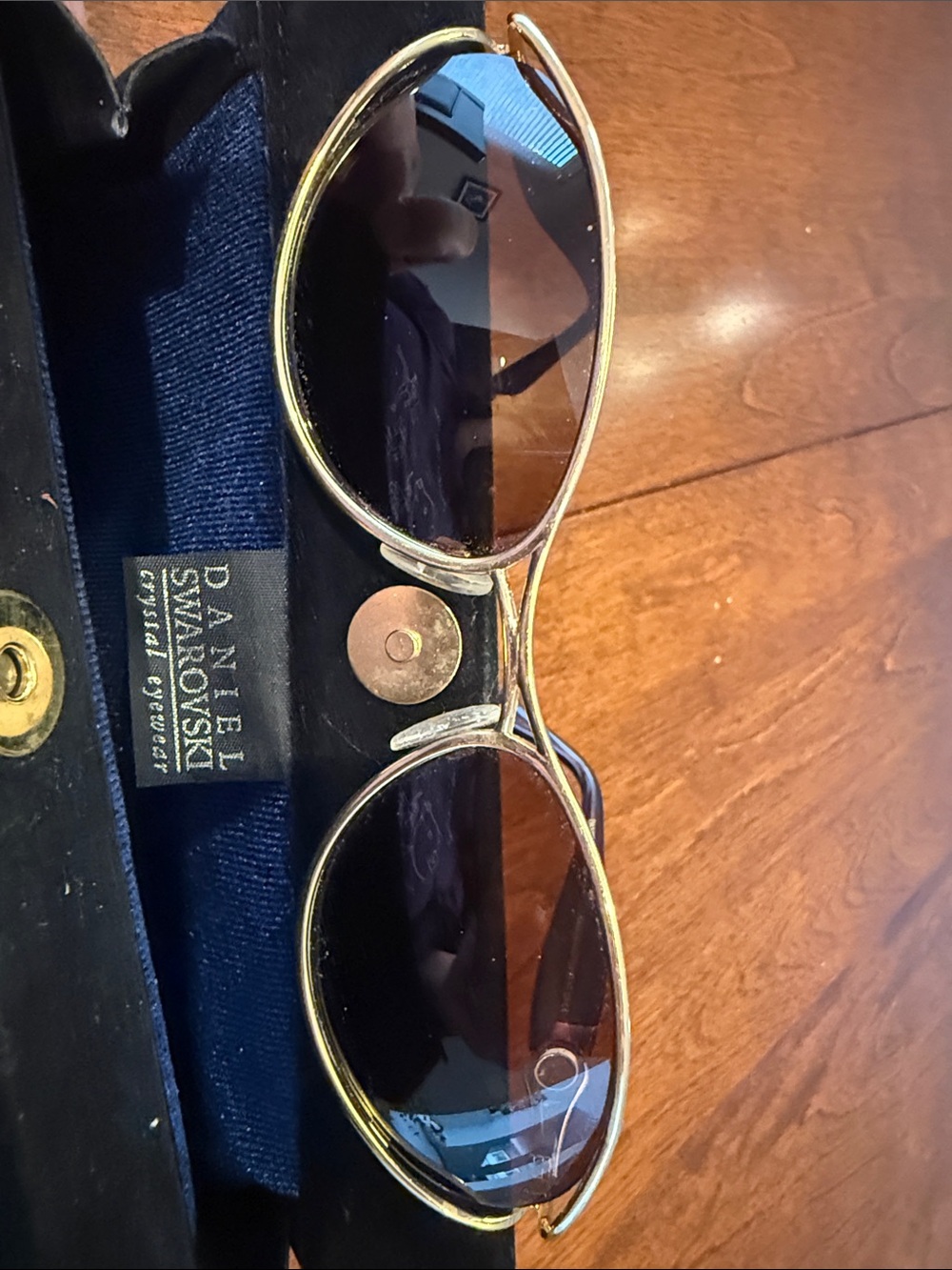 Vintage Daniel Swarovski sunglasses 23k gold rimmed and crystals on the side.